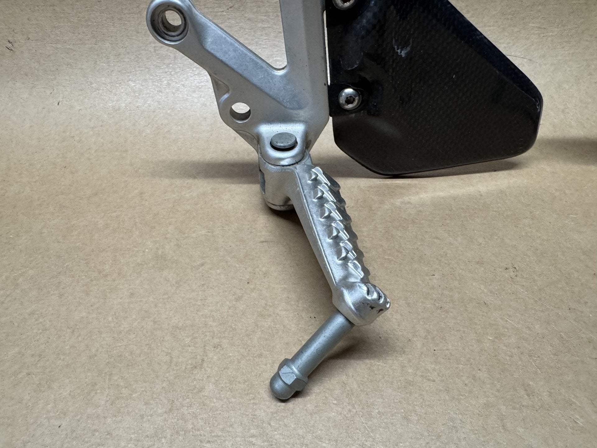 OEM front foot peg hangers for Aprilia RSV 1000 2004-2010