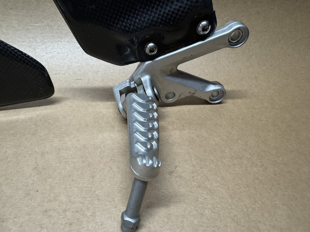 OEM front foot peg hangers for Aprilia RSV 1000 2004-2010