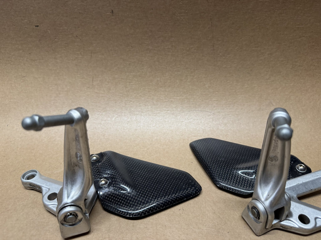OEM front foot peg hangers for Aprilia RSV 1000 2004-2010