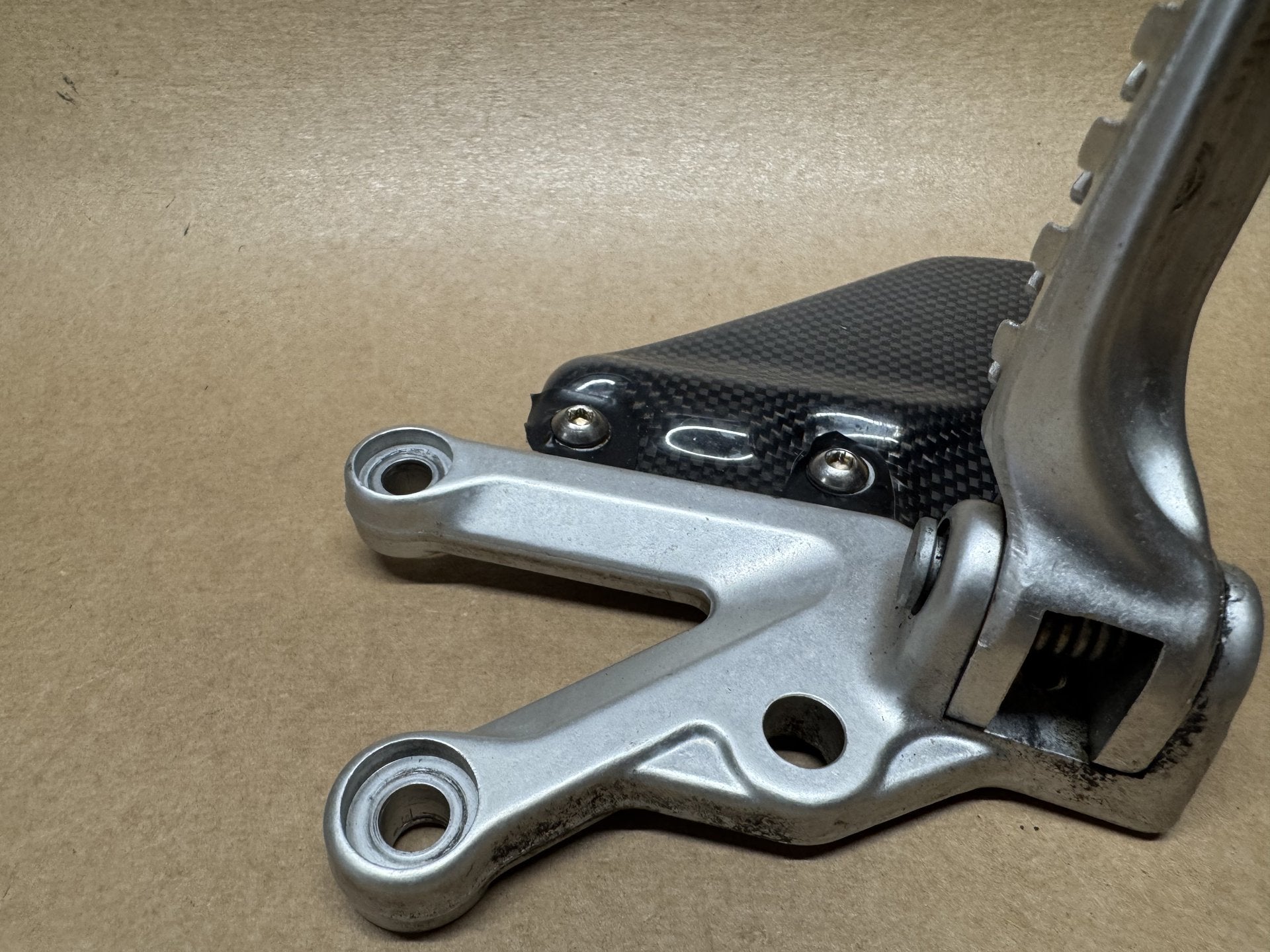 OEM front foot peg hangers for Aprilia RSV 1000 2004-2010