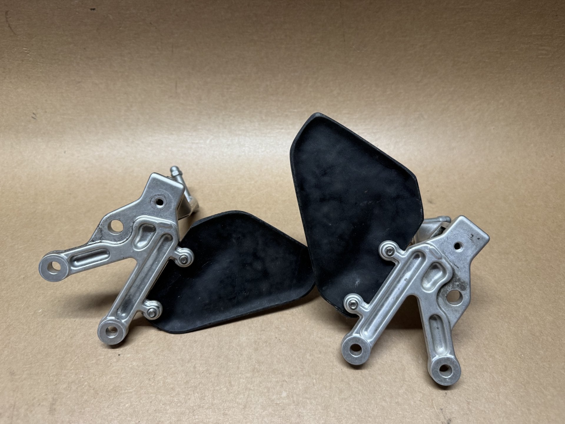 OEM front foot peg hangers for Aprilia RSV 1000 2004-2010