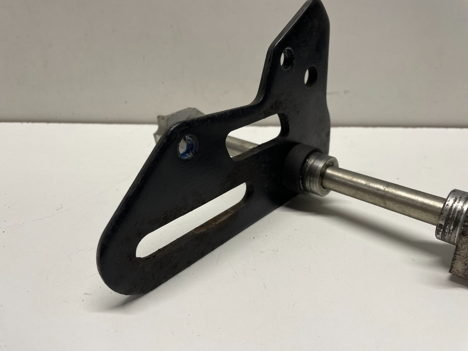 Rear Spindle & Caliper Bracket Benelli BN 125 2019 - 2022